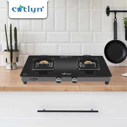 Catlyn - 2 Burner Crystal Black Glass Gas Stove with Black SS Mirror Finish Frame, Square Pan Support, Brass Top (DOOM - 2502)